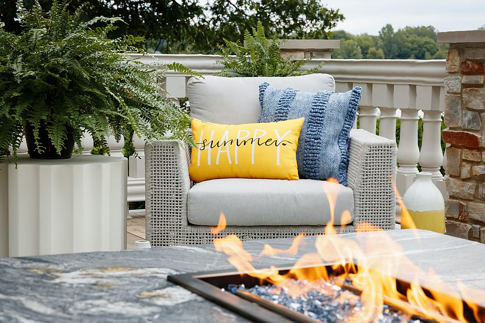 Outdoor patio furniture arranged for comfortable conversation and entertaining.